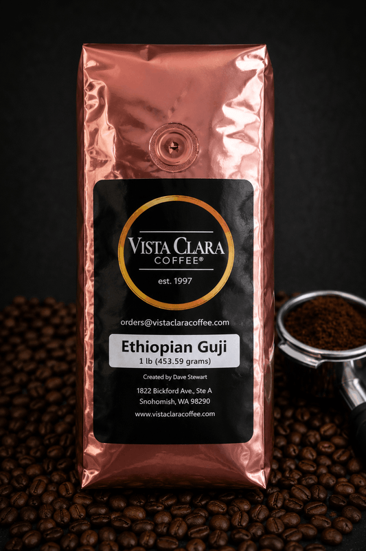 Vista Clara Coffee package with coffee beans and an espresso scoop in the background - Ethiopian Guji